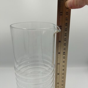 May include: A rustic wooden sign with the text "Welcome to our porch" in white lettering. The sign features a distressed finish and a simple, inviting design, perfect for outdoor decor.