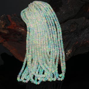 AAA+ Quality Natural White Rainbow Flashy Ethiopian Opal Smooth Rondelle Shape Beads Fire Opal Beads 3-5MM Gemstone Welo Opal Jewelry Gift