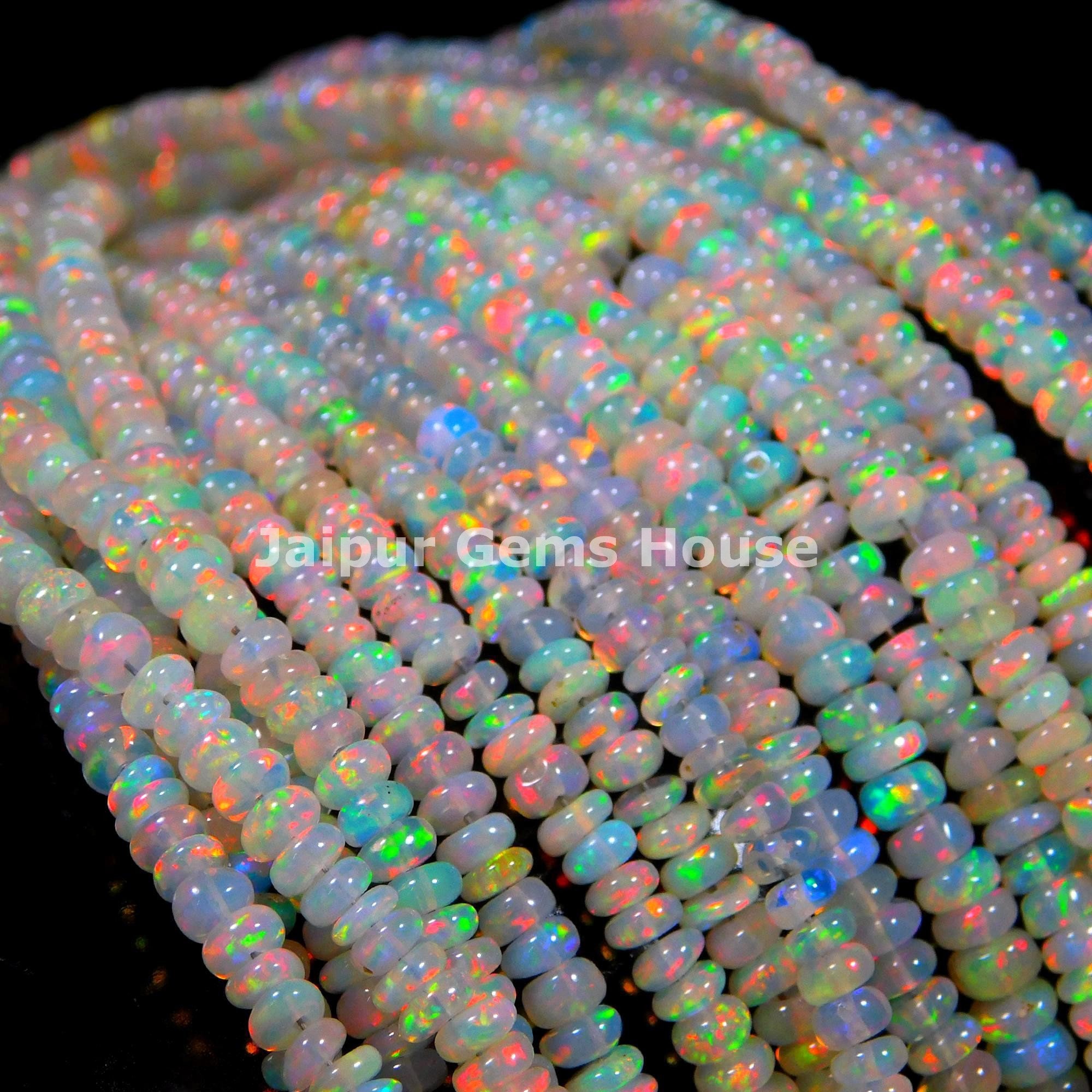 AAA+ Disco Ethiopian Opal Smooth Rondelle Beads - Multi Color Opal Smo –  Ali Gems International