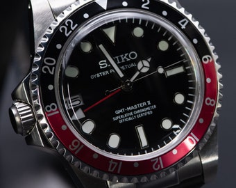 Seiko homage Destro Coke GMT Master II "Thick" edition with solid end link rubber strap with clasp.