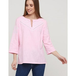 Modern women&#39;s pale pink embroidered shirt  for a women  of natural linen