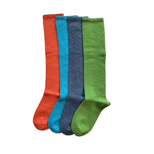 May include: Four pairs of knee-high socks in orange, blue, gray, and green.