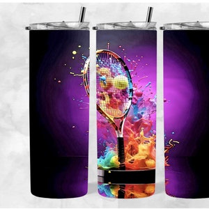 May include: A stainless steel tumbler with a colorful paint splatter design and a tennis racket with tennis balls. The background is a dark purple.