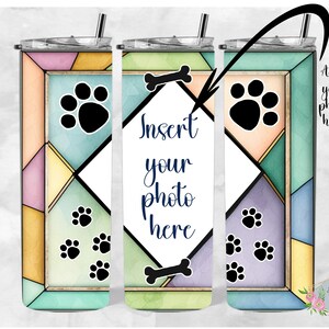 May include: A set of three stainless steel tumblers with a colorful geometric design featuring paw prints and bones. The tumblers have a white space in the center for adding a photo. The text "Insert your photo here" is printed on the middle tumbler.