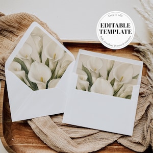 Puede incluir: Dos sobres blancos con un diseño floral de calas blancas y hojas verdes. Los sobres están abiertos, revelando el patrón floral en el interior. El texto "Easy to edit EDITABLE TEMPLATE Edit, download & print in minutes" está en un círculo.
