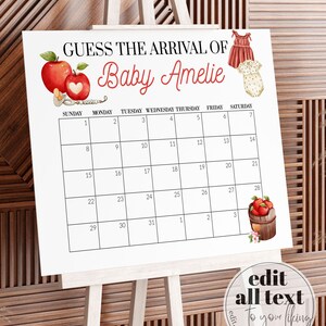 May include: A white easel displays a calendar with the text "GUESS THE ARRIVAL OF Baby Amelie." The calendar grid is blank, with illustrations of apples, baby clothes, and a wooden barrel with apples. The bottom right corner has the text "edit all text to your liking."