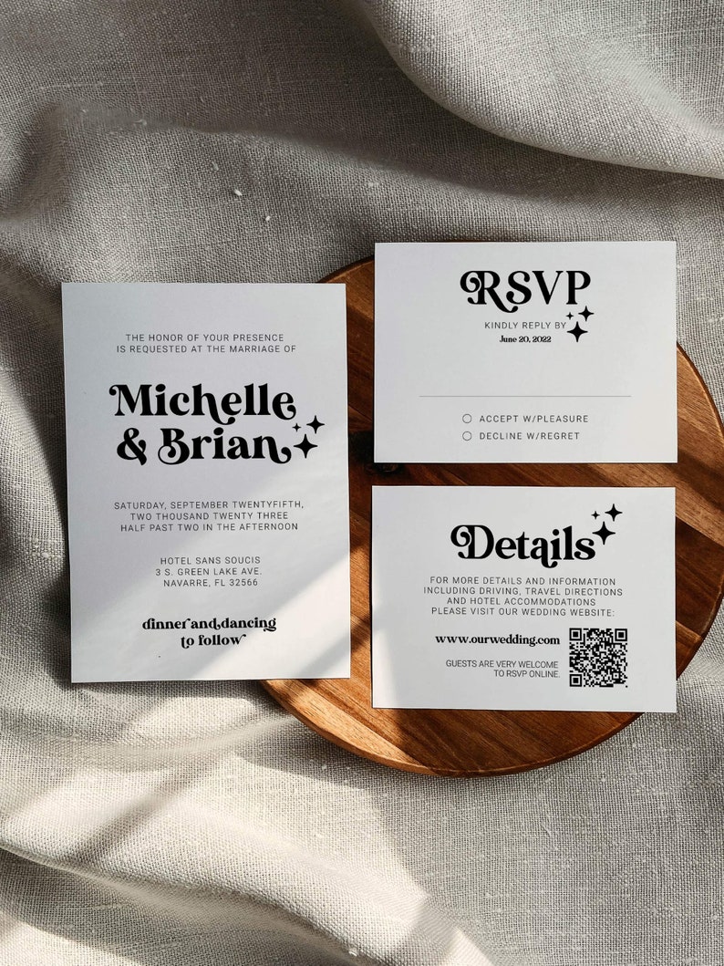 May include: Wedding invitation with a black and white design. The invitation features the names "Michelle & Brian" in a retro font with stars. The invitation includes the date and time of the wedding, the location, and the RSVP information. The RSVP card includes a QR code for guests to RSVP online.