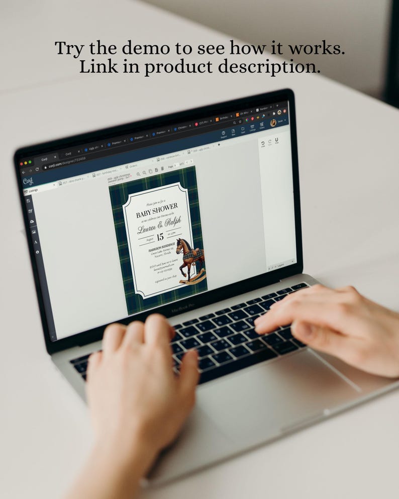 May include: A laptop screen showing a baby shower invitation design. The invitation has a navy and green tartan border, with the words "BABY SHOWER" and details for Lauren & Ralph's event on the 15th. The text "Try the demo to see how it works. Link in product description." is also visible.