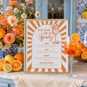 Editable Italian spritz bar menu sign template with orange citrus cocktail artwork for a summer bridal shower, bachelorette, birthday or pool party drink station.