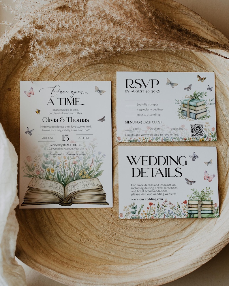 May include: A wedding invitation suite with a whimsical fairytale theme. The invitation features an open book with floral illustrations and the text "Once upon a time... Olivia & Thomas". The RSVP card has a stack of books with butterflies and the text "RSVP by August 20, 20XX". The wedding details card has a stack of books with butterflies and the text "Wedding Details".