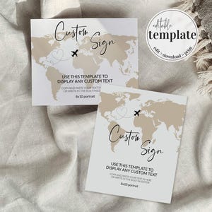 May include: Two white custom sign templates with a beige world map design. The signs have the text "Custom Sign" in script, with a heart and airplane graphic. The signs are 8x10 portrait, approximately 20 x 25 cm.