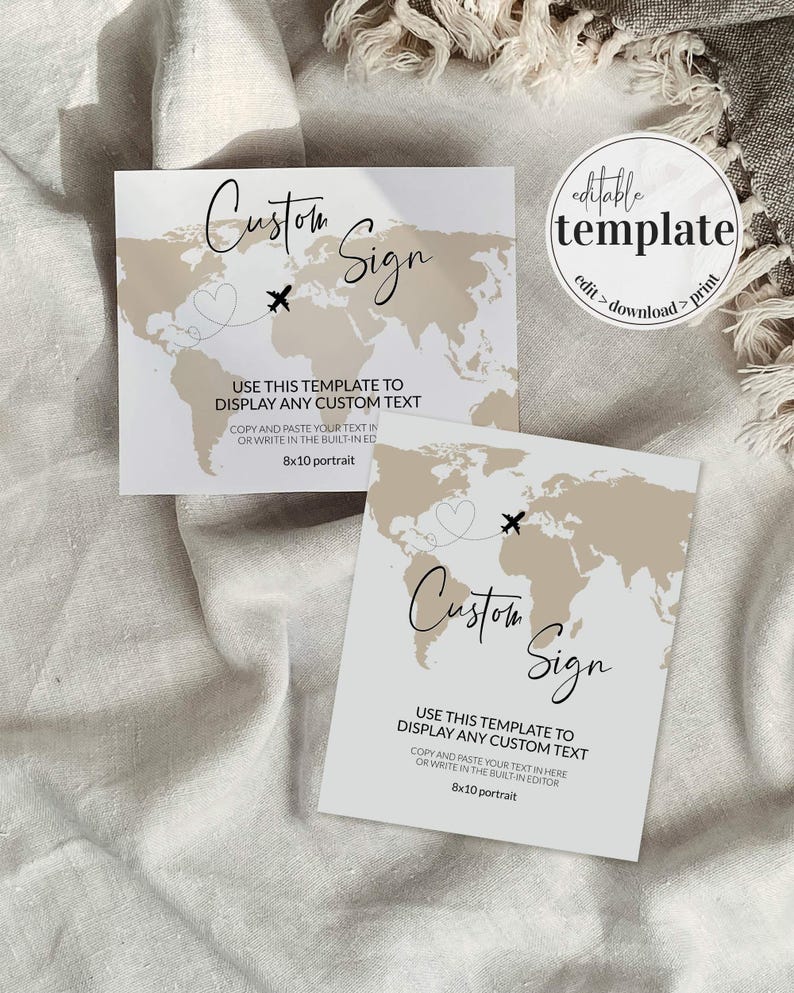 May include: Two white custom sign templates with a beige world map design. The signs have the text "Custom Sign" in script, with a heart and airplane graphic. The signs are 8x10 portrait, approximately 20 x 25 cm.