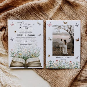 May include: A wedding invitation with a whimsical design featuring a book with butterflies and flowers. The text reads "Once upon a time... Olivia & Thomas" and includes the date and time of the wedding.