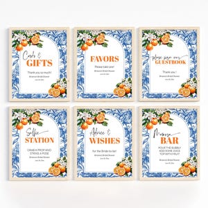 May include: Six printable 8x10 inch signs for a bridal shower with a blue and white tile pattern and orange blossoms. The signs include "Cards & Gifts", "Favors", "Please Sign Our Guestbook", "Selfie Station", "Advice & Wishes", and "Mimosa Bar".
