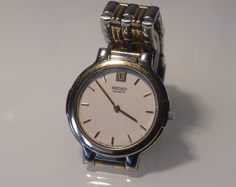 Seiko Women's Silver and Gold Watch