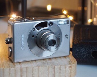 Canon IXUS 2, very good for lomography.