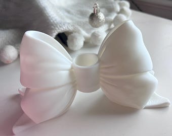 Schleifenkerzenhalter