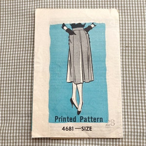 May include: A vintage sewing pattern for a skirt. The pattern is printed on a white paper with a blue background. The pattern shows a woman wearing a gray skirt with a white underskirt. The pattern number is 4681 and the size is not specified. The text "Printed Pattern" is printed at the bottom of the pattern.