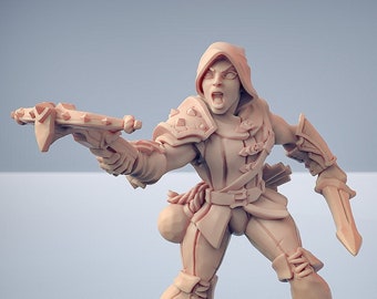 May include: A miniature figurine of a female character wearing a hooded cloak and holding a crossbow. She is wearing leather armour and has a determined expression on her face. The figurine is painted in a light brown colour and is standing on a round base.