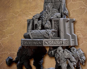 May include: A gray, detailed miniature of a king sitting on a throne carried by four dwarves. The throne is ornately carved with intricate designs. The king is wearing a crown and armor. The dwarves are carrying the throne on their shoulders. The miniature is set on a gray base.