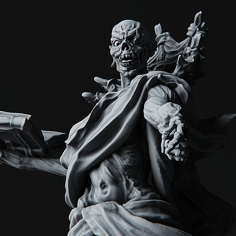 May include: A detailed, gray, 3D printed sculpture of a skeletal figure with a skull-like face, wearing a flowing robe and holding a book. The figure has a menacing expression and appears to be in a state of decay.