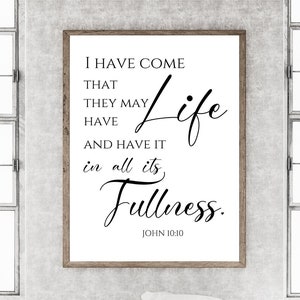 May include: A black and white printable wall art print with a quote from the Bible, John 10:10, that reads "I have come that they may have life and have it in all its fullness."