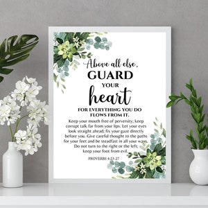 May include: A white printable wall art print with a green floral design and the text "Above all else, GUARD YOUR heart FOR EVERYTHING YOU DO FLOWS FROM IT. Keep your mouth free of perversity; keep corrupt talk far from your lips. Let your eyes look straight ahead; fix your gaze directly before you. Give careful thought to the paths for your feet and be steadfast in all your ways. Do not turn to the right or the left; keep your foot from evil. PROVERBS 4:23-27"