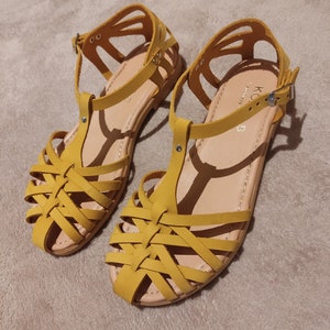 Handmade closed toe strap sandalfor everyday use. It is a nice flat strappy sandal in yellow nubuck leather. One of the most popular buckle strap sandal of this summer! Women light minimalist sandal with soft insole and rubber sole for extra comfort!