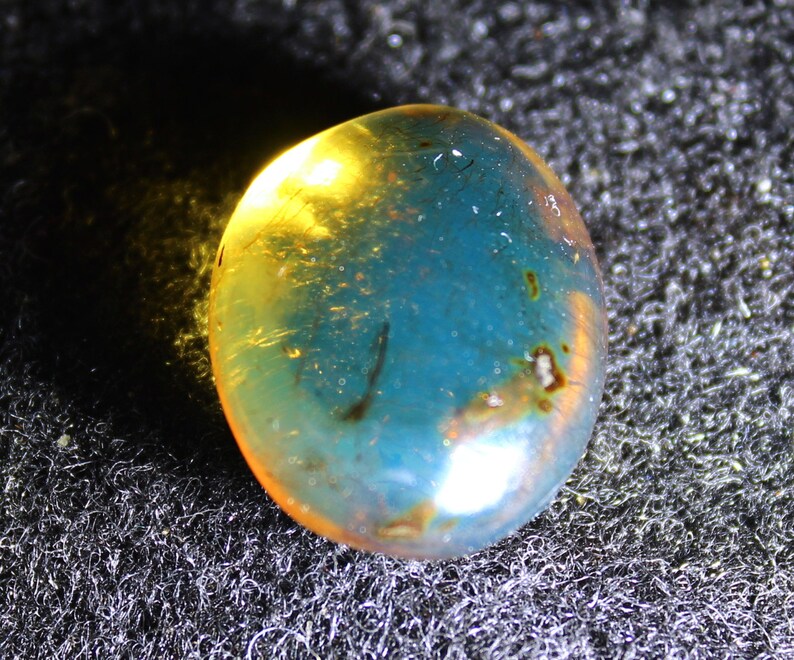 Outstanding Dominican Natural Clear Deep Blue Amber Polished Oval Stone 23x18x11mm 13cts