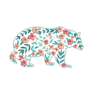 May include: An embroidered design of a bear silhouette filled with pink and peach flowers and teal leaves.