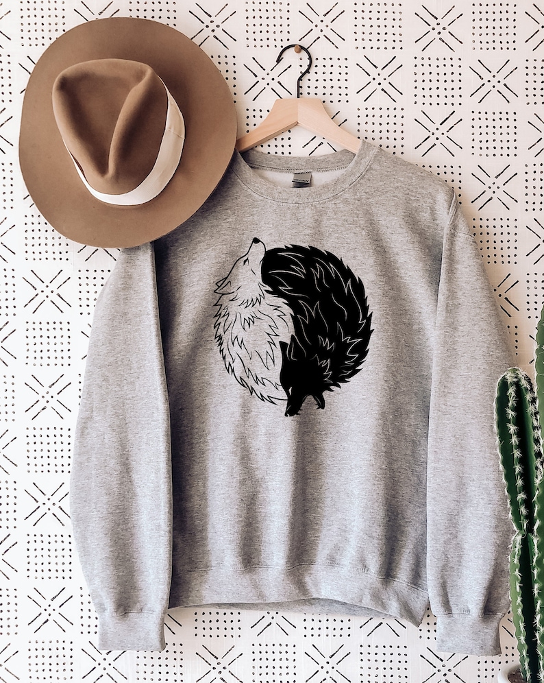 ying and yang jumper