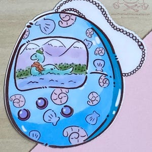 Autocollant numérique en vinyle brillant Tamagotchi pour animal de compagnie, monstre Nessy du Loch Ness