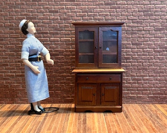 Dresser with two glass doors and two working doors, and one large working drawer. 1:12 scale for dollhouses. 20401.