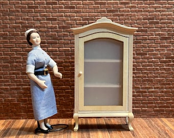 DIY Display case made of unpainted wood, with a police hat top, curved legs, and a large.  1:12 scale for dollhouses.  197003