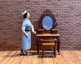 Wooden dressing table and bench set, featuring an oval mirror with an ornate frame, four curved legs. 1:12 scale for dollhouses. 22501.