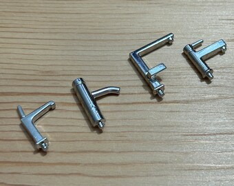 Miniature faucets with modern looks and chrome finishes. 1/24-1/12 scale for dollhouses. 12411-12-13-14