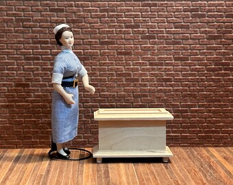 DIY Wooden toy chest with a functional lid and molded base, and turned legs. 1 1/12 scale for dollhouses. 22300