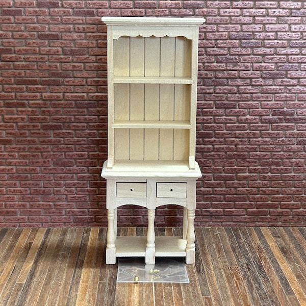 False two-body sideboard. 1/12 Scale in unpainted wood. Beautiful. 2 drawers, 2 shelves, turned legs. Hardware provided. 10904.