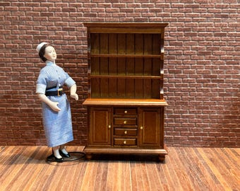 Tall Open-fronted dresser with two shelves, two doors, and four functional drawers, with turned legs. 1:12 scale for dollhouses. 20402.