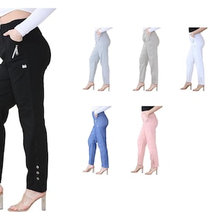 May include: Five pairs of women's trousers in different colours: black, light blue, light grey, white, and pink. The trousers have a zipped pocket on the side and button details on the bottom of the legs.