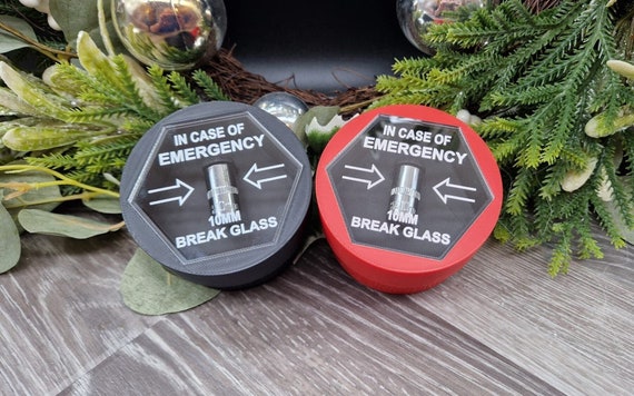 A handmade gift box enshrining the mythical 'lost 10mm socket' — a perfectly niche inside joke that every mechanic and gearhead will immediately get.