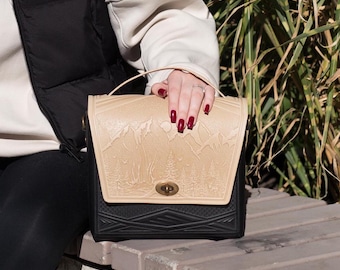 Black and Ivory embossed leather bag: a roomy shoulder bag for work and travel