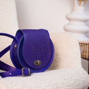 Ultra Blue Leather Shoulder Bag: Round Embossed Handbag