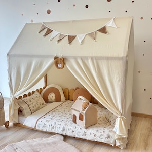 Soft cotton canopy creating reading nook play corner
