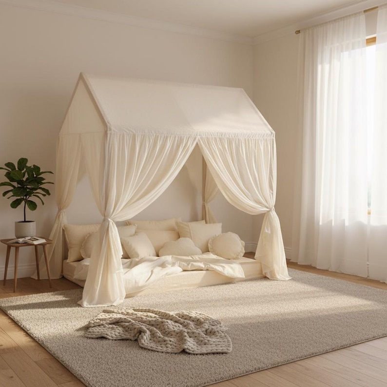 Muslin fabric canopy over reading pillows
