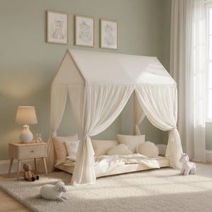 Muslin fabric canopy over reading pillows