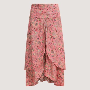 May include: A pink maxi skirt with a paisley print and a tiered ruffle design.