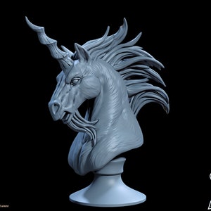 May include: A detailed, light gray bust of a unicorn with a spiraled horn and flowing mane. The sculpture has a textured surface and is mounted on a pedestal. The Quest Pirates logo is in the lower right corner.