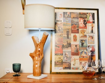 Handcrafted wooden table lamp, made of Greek olive wood branch combined with white granite base, beige lampshade and white fabric cable.