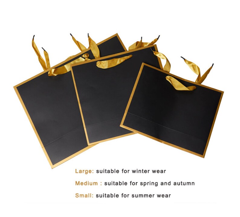 May include: Three black gift bags with gold trim and gold ribbon handles. The bags are arranged in a stack, with the largest bag on the bottom and the smallest bag on top. The text on the image reads: "Large: suitable for winter wear", "Medium: suitable for spring and autumn", and "Small: suitable for summer wear".